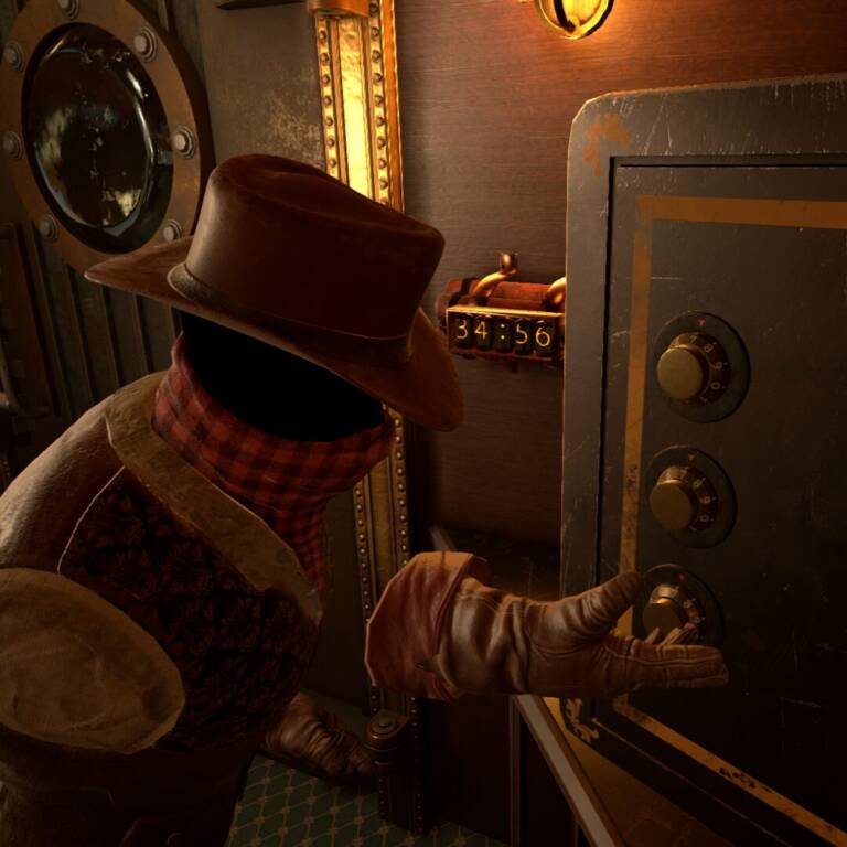 bandito che apre la cassaforte